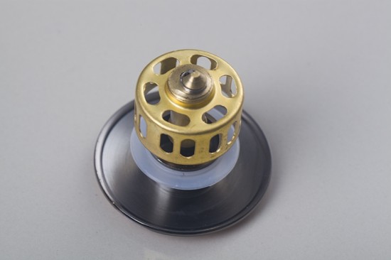 Gouden pop-up afvoer click afvoer met overloop goud kleurig