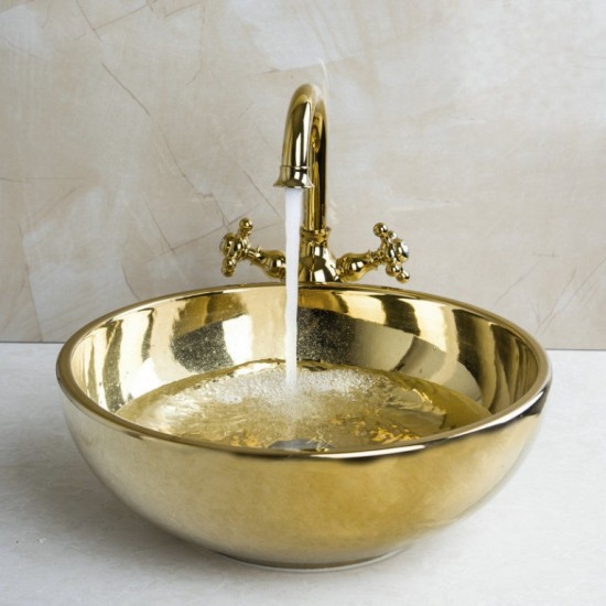 Gouden afgewerkte wastafel kraan met hand geschilderde goudkleurige glazen waskom